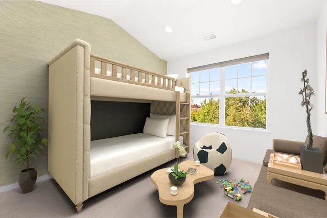 a bedroom with furniture and a window