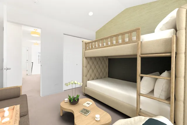 a bedroom with a bed and a couch