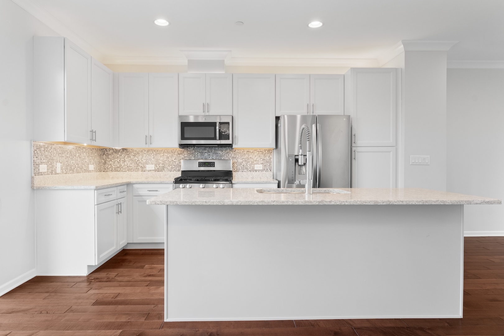 1228 Elm Street Park Ridge, IL 60068 - Photo 4 of 36 a kitchen with appliances a sink and cabinets