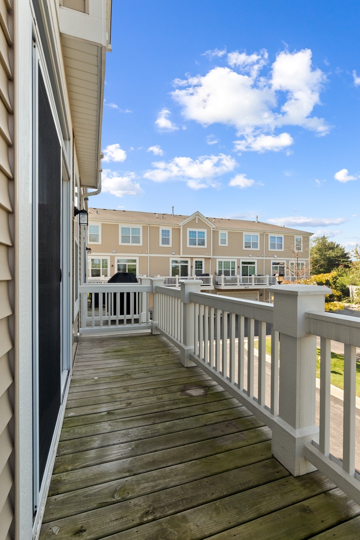 1228 Elm Street Park Ridge, IL 60068 - Photo 9 of 36 a view of a balcony with wooden floor