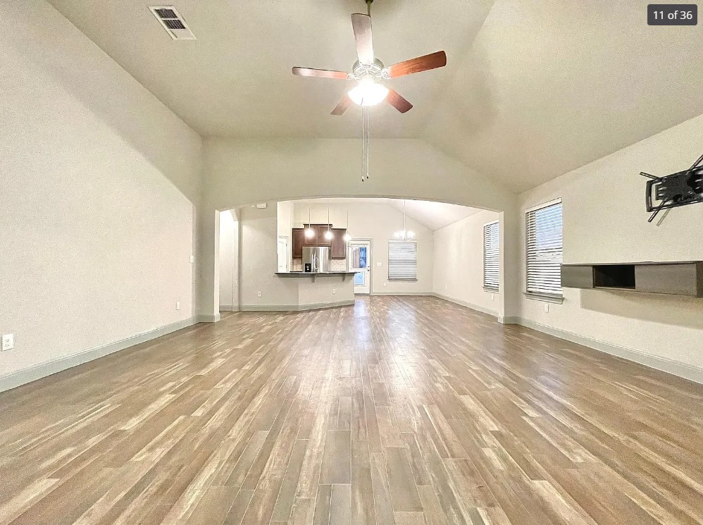 205 Jude Circle Leander, TX 78641 - Photo 2 of 36 a view of empty room with wooden floor