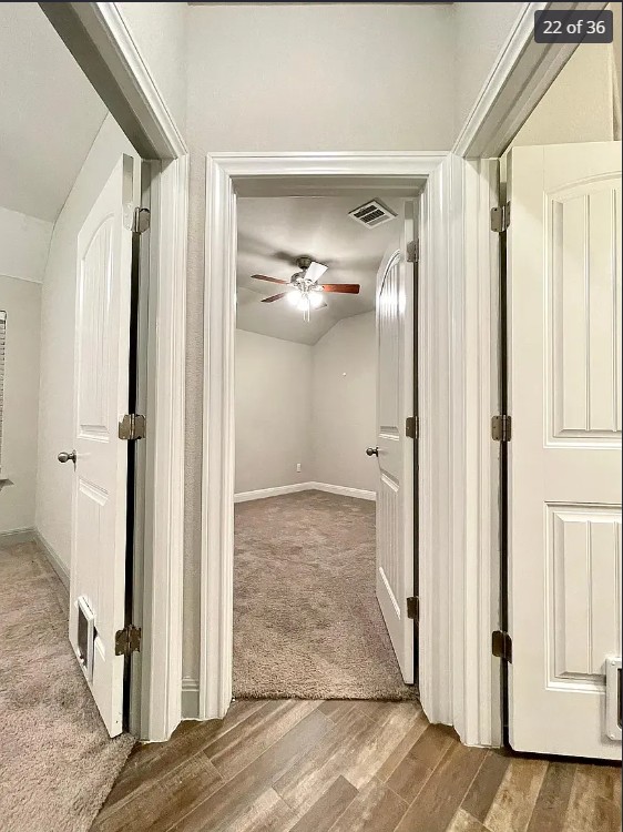 205 Jude Circle Leander, TX 78641 - Photo 20 of 36 a view of a hallway with wooden floor and staircase