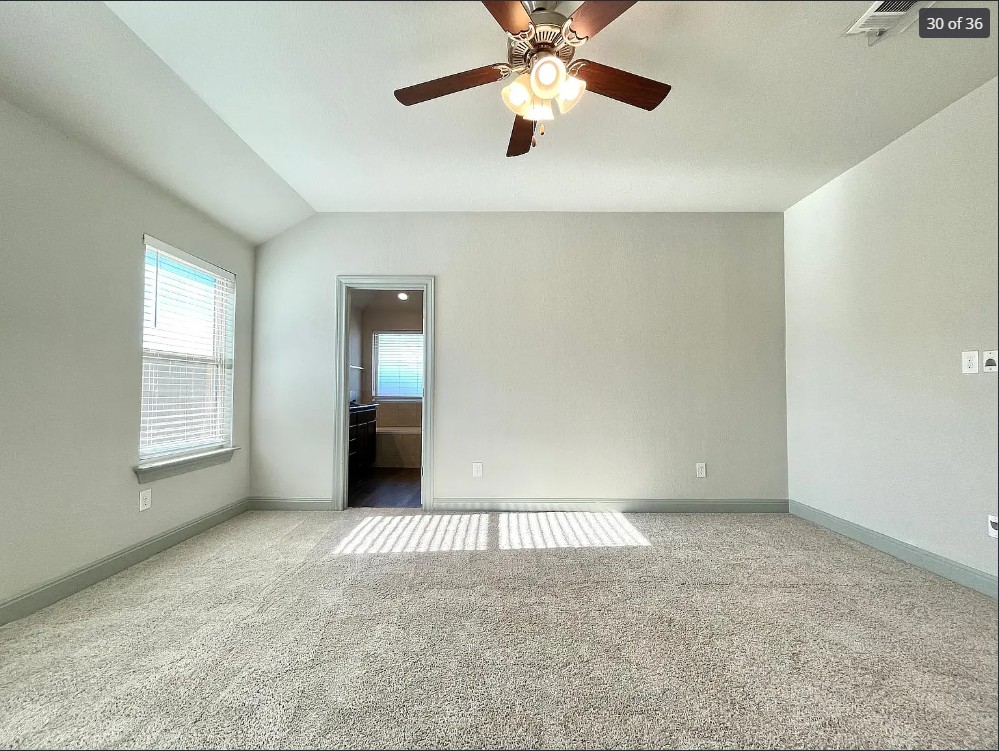 205 Jude Circle Leander, TX 78641 - Photo 28 of 36 an empty room with windows and fan