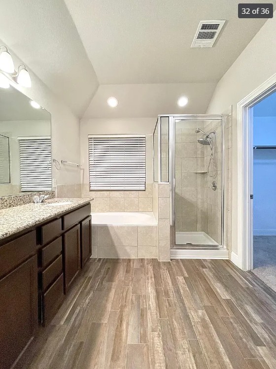205 Jude Circle Leander, TX 78641 - Photo 30 of 36 a spacious bathroom with a shower a sink and a bathtub