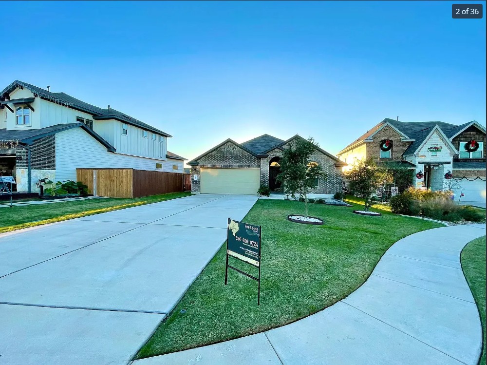 205 Jude Circle Leander, TX 78641 - Photo 35 of 36 a front view of a house with a yard