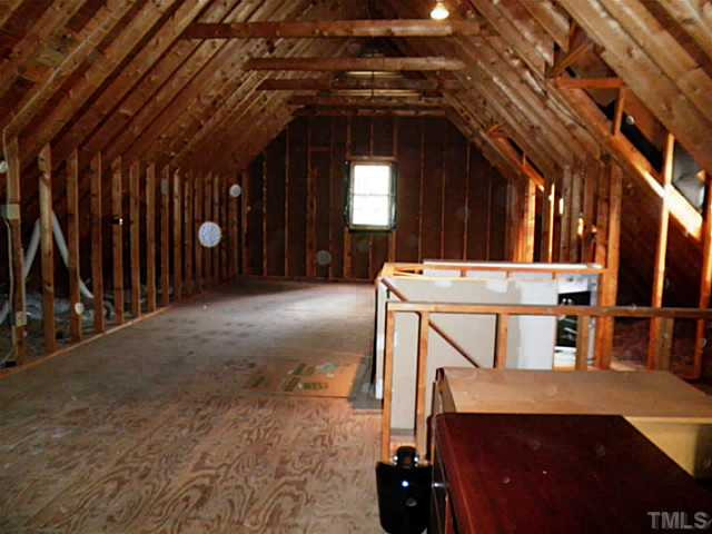 800 Thatcher Way Raleigh, NC 27615 - Photo 24 of 25 Need more rooms! Here is your floored 3rd floor to work with, or just store all your extra stuff!
