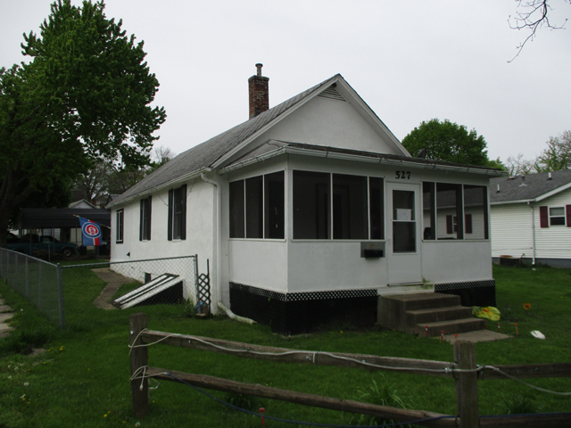 527 East Dakota Street Spring Valley, IL 61362 - Photo 1 of 12 a front view of a house with a yard