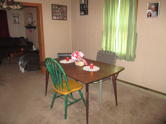 527 East Dakota Street Spring Valley, IL 61362 - Photo 5 of 12 a view of a dining room with furniture and a window