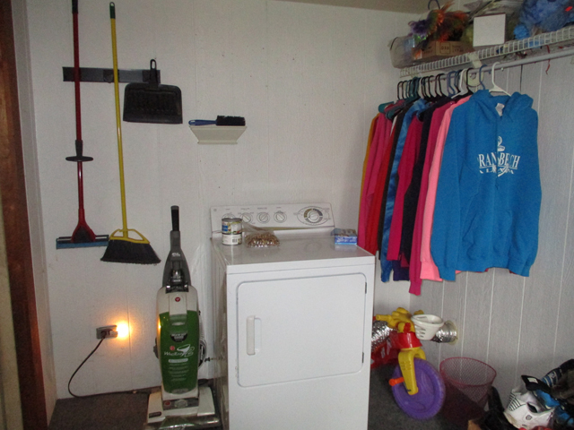 527 East Dakota Street Spring Valley, IL 61362 - Photo 10 of 12 a view of walk in closet with clothes and shoes