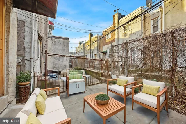 a building outdoor space with patio furniture