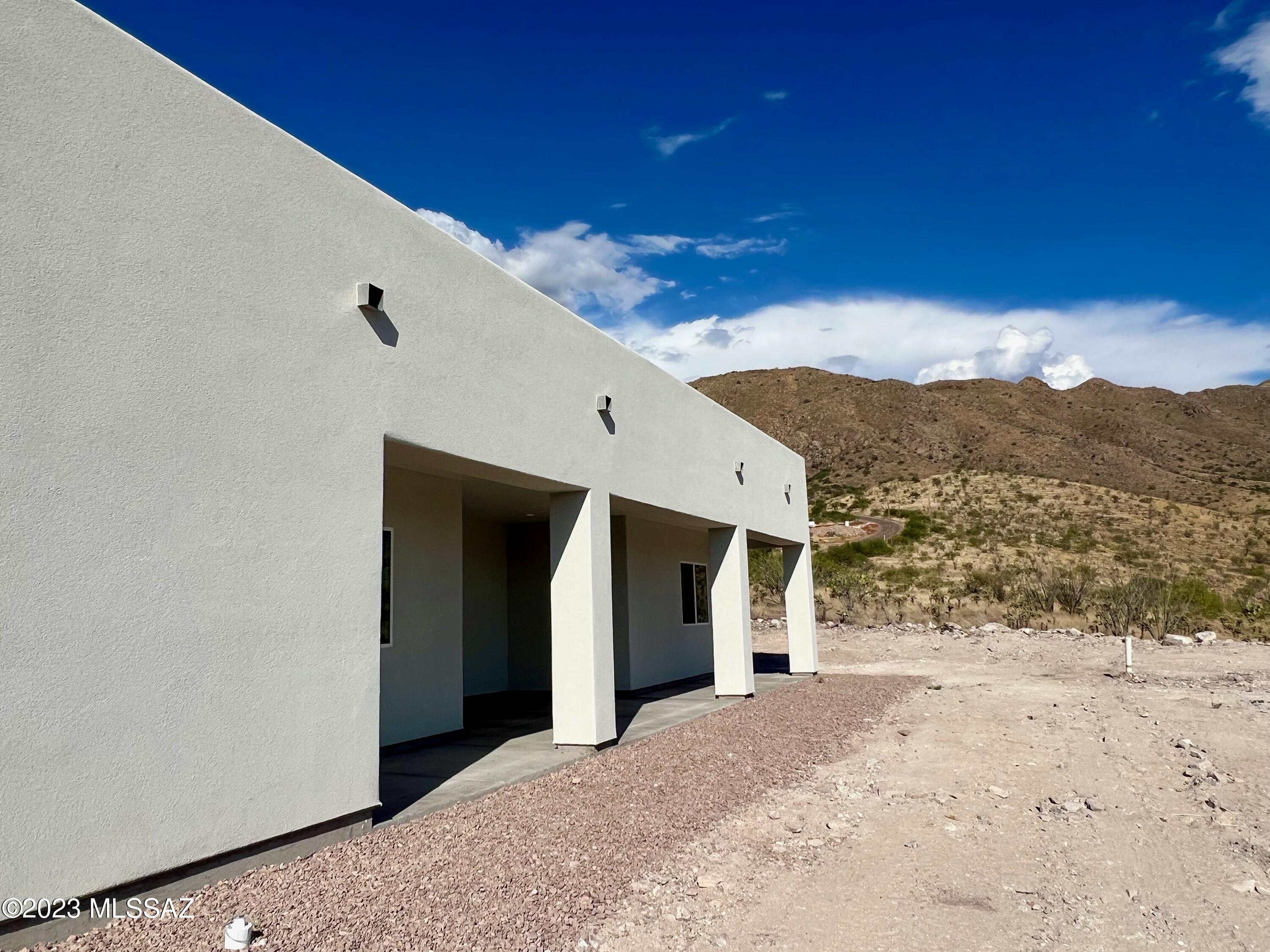 353 Dock Street Rio Rico, AZ 85648 - Photo 50 of 50 a view of a house with a snow in the yard