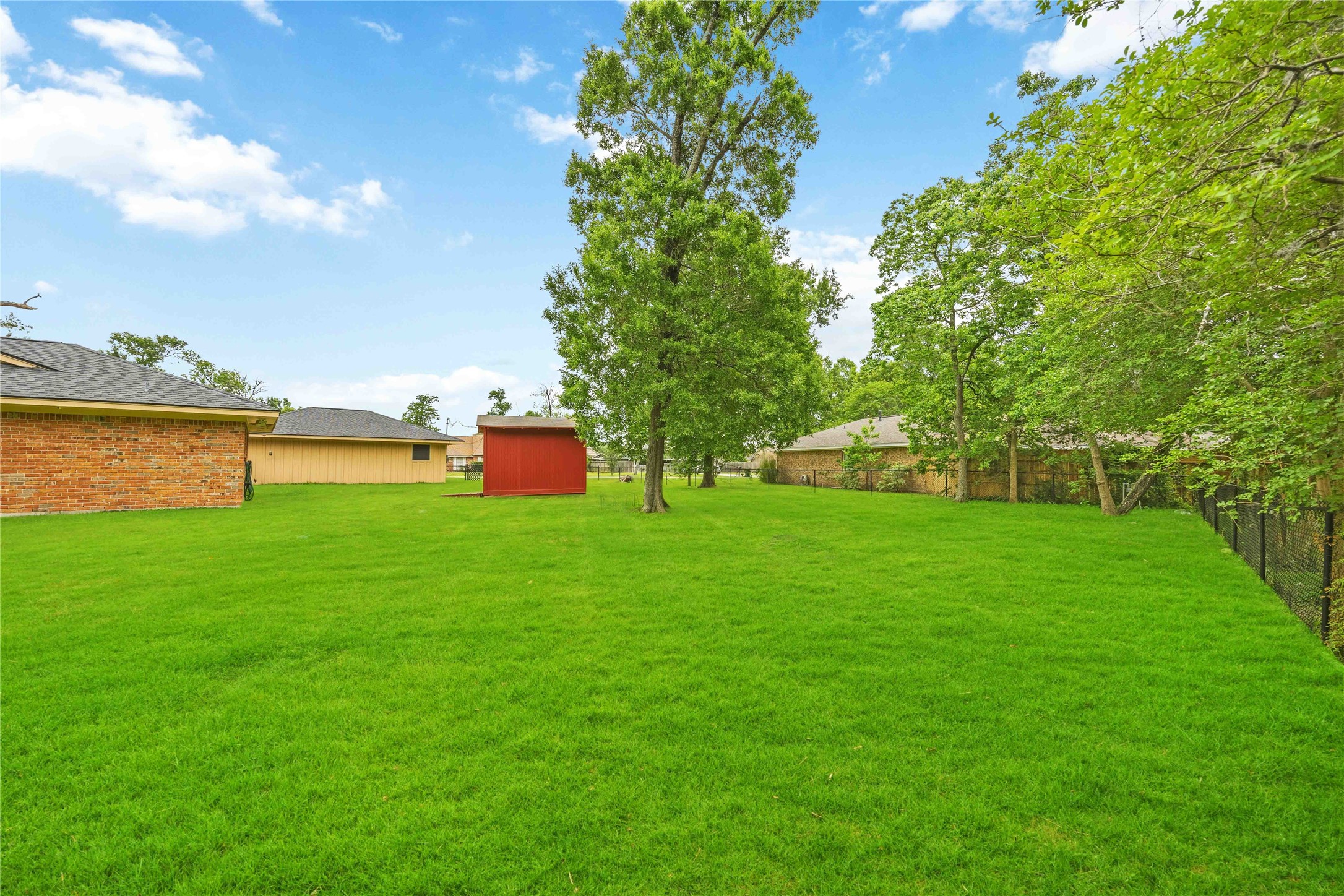 435 Rolling Wood Road Baytown, TX 77520 - Photo 28 of 29 Fully fenced back yard