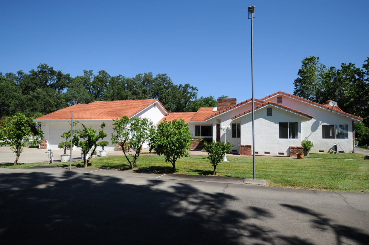 6471 Riverside Drive Redding, CA 96001 - Photo 26 of 56 a house view with a garden space