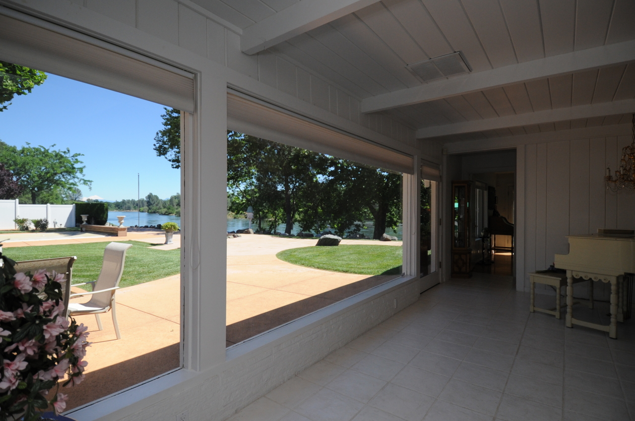 6471 Riverside Drive Redding, CA 96001 - Photo 36 of 56 a view of swimming pool with a porch