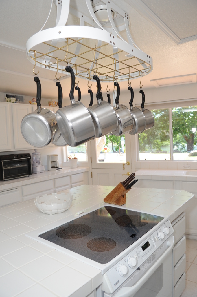 6471 Riverside Drive Redding, CA 96001 - Photo 46 of 56 a kitchen with a sink a stove and a table