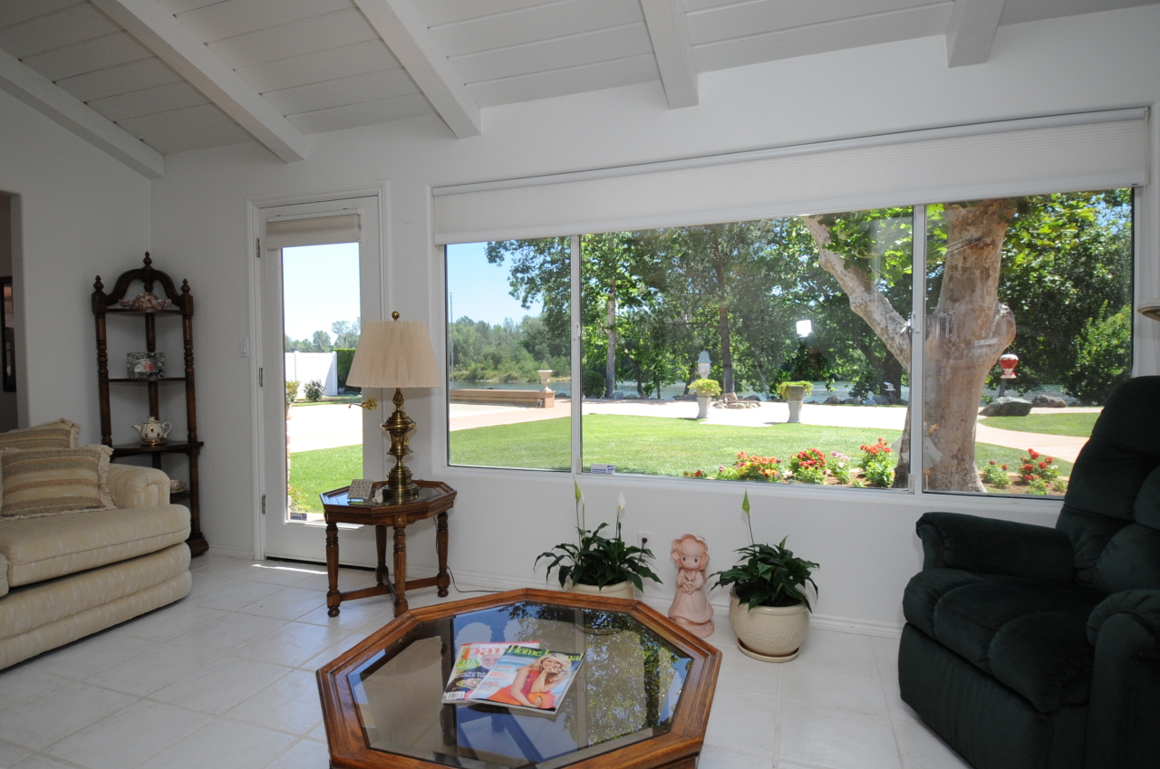 6471 Riverside Drive Redding, CA 96001 - Photo 48 of 56 a living room with furniture and a large window
