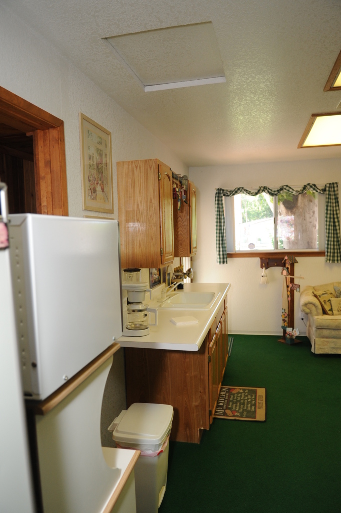 6471 Riverside Drive Redding, CA 96001 - Photo 53 of 56 a bathroom with a sink toilet and mirror