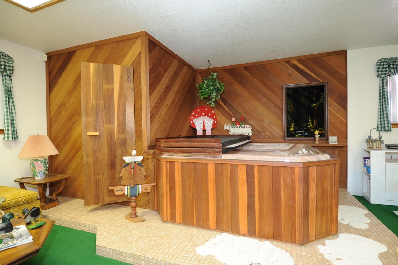6471 Riverside Drive Redding, CA 96001 - Photo 54 of 56 a bedroom with bed and a dresser