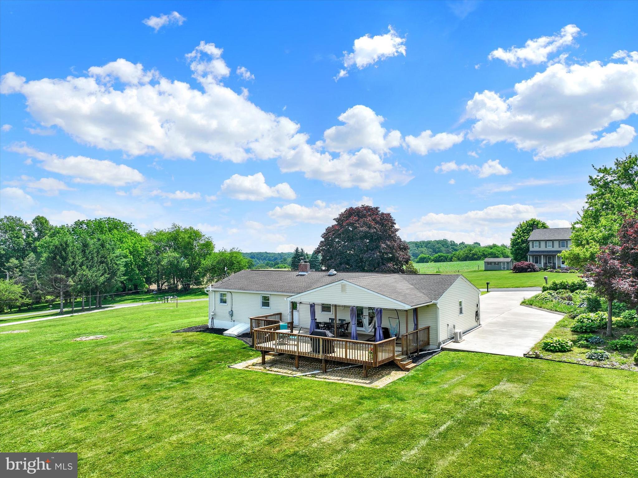 13174 Mont Road Felton, PA 17322 - Photo 8 of 39 a view of a house with pool garden and a yard