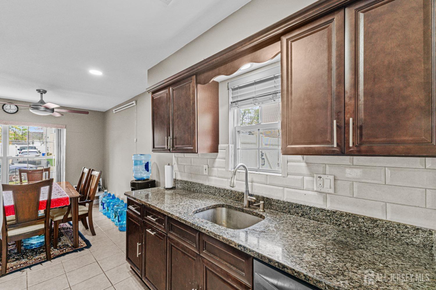 26 Brewster Circle Old Bridge, NJ 08857 - Photo 12 of 43 a kitchen with sink and cabinets