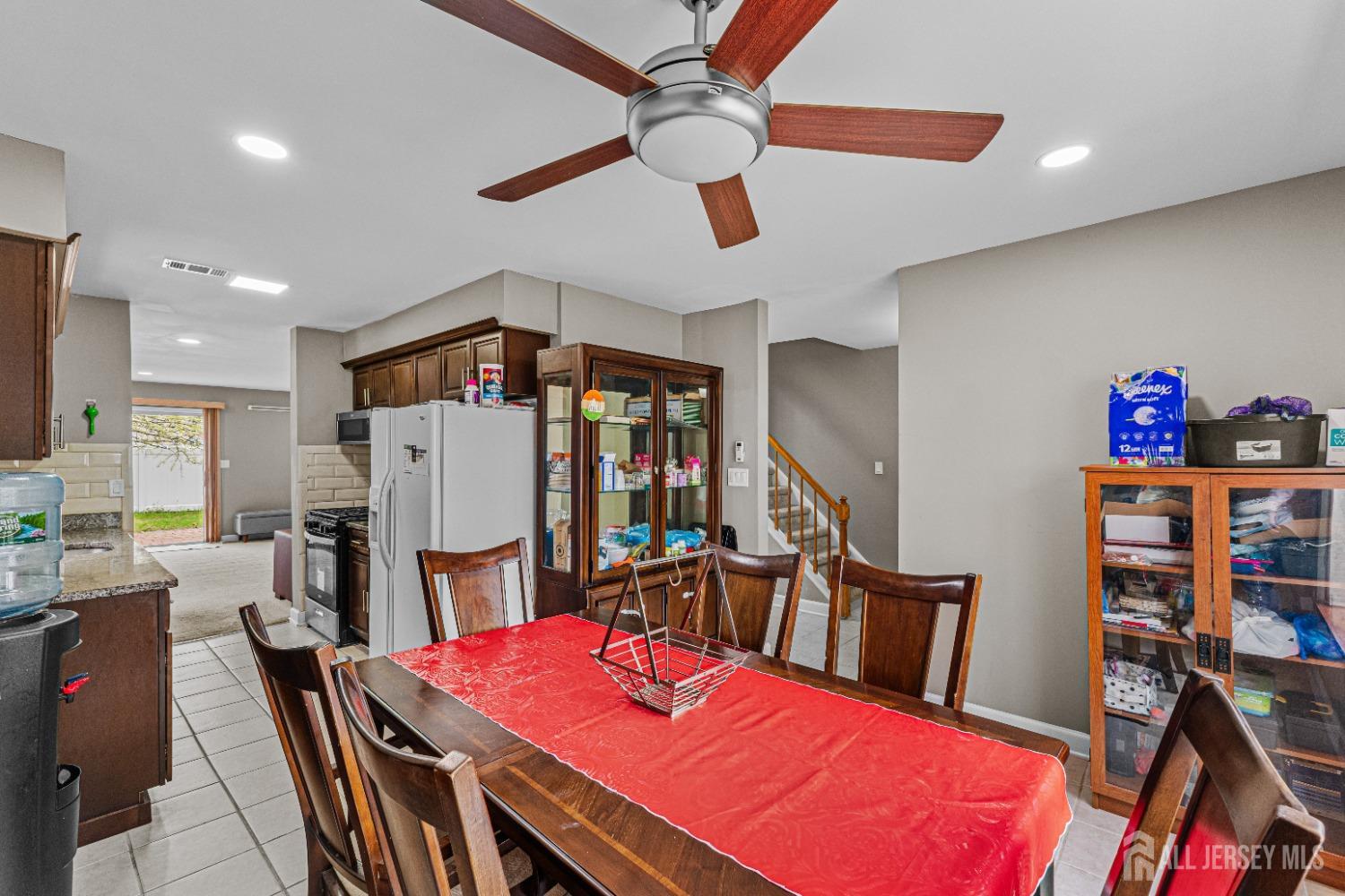 26 Brewster Circle Old Bridge, NJ 08857 - Photo 17 of 43 a view of a dining room with furniture and wooden floor