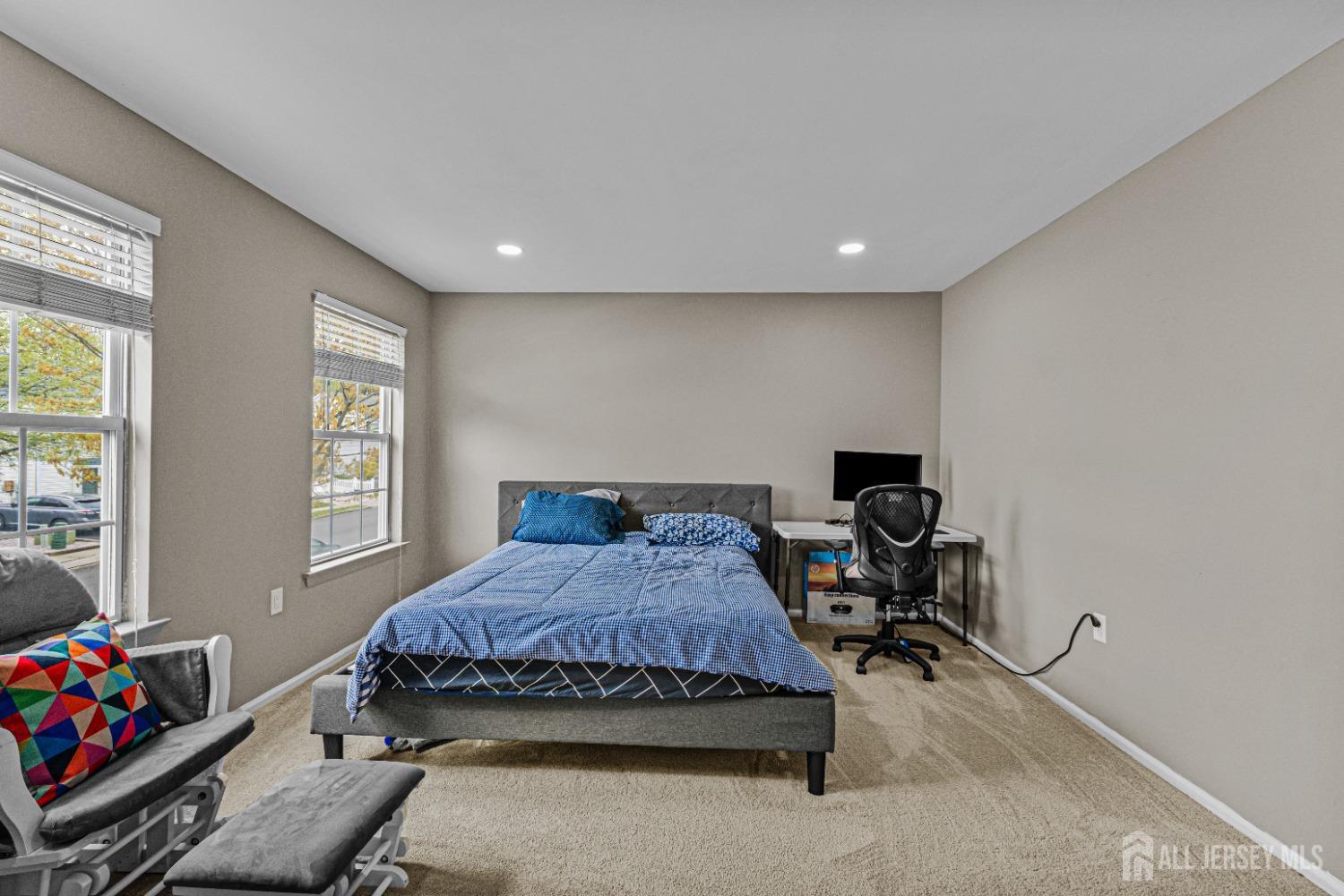 26 Brewster Circle Old Bridge, NJ 08857 - Photo 22 of 43 a bedroom with a bed and a window