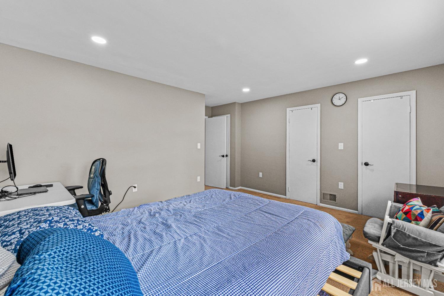 26 Brewster Circle Old Bridge, NJ 08857 - Photo 23 of 43 a bedroom with a bed and a chair