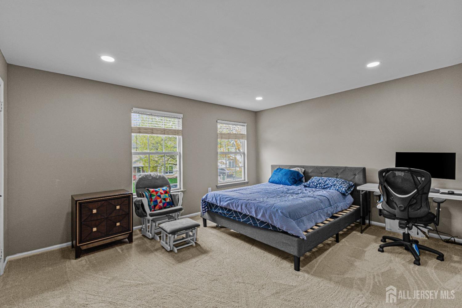 26 Brewster Circle Old Bridge, NJ 08857 - Photo 24 of 43 a bedroom with a bed and a desk