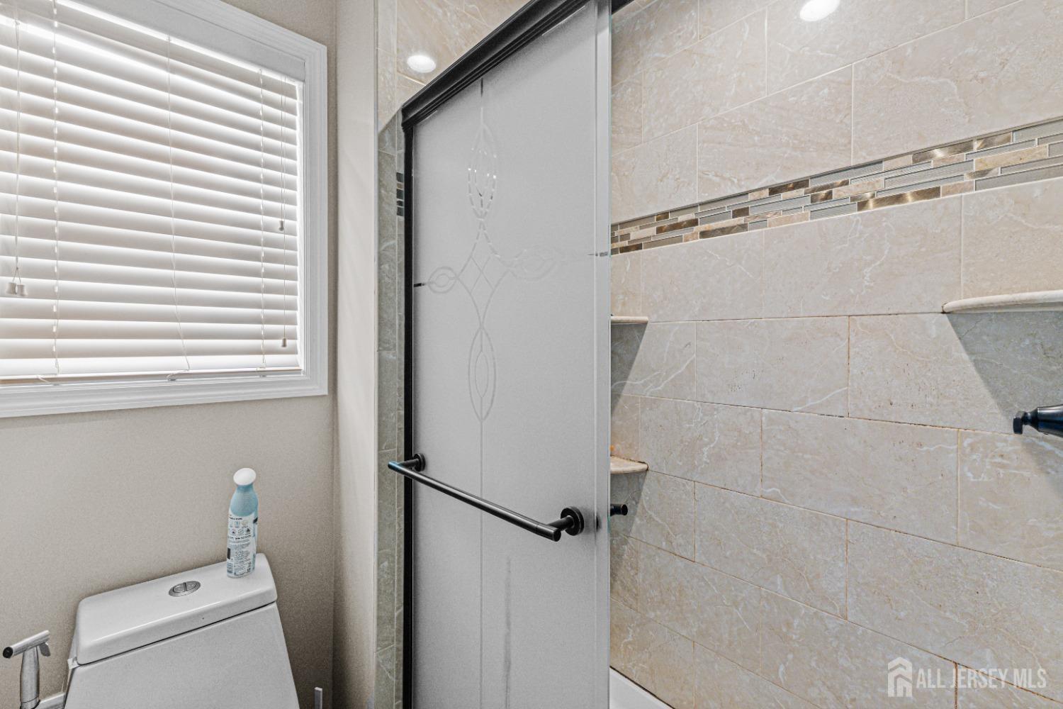 26 Brewster Circle Old Bridge, NJ 08857 - Photo 27 of 43 a bathroom with a washer and dryer