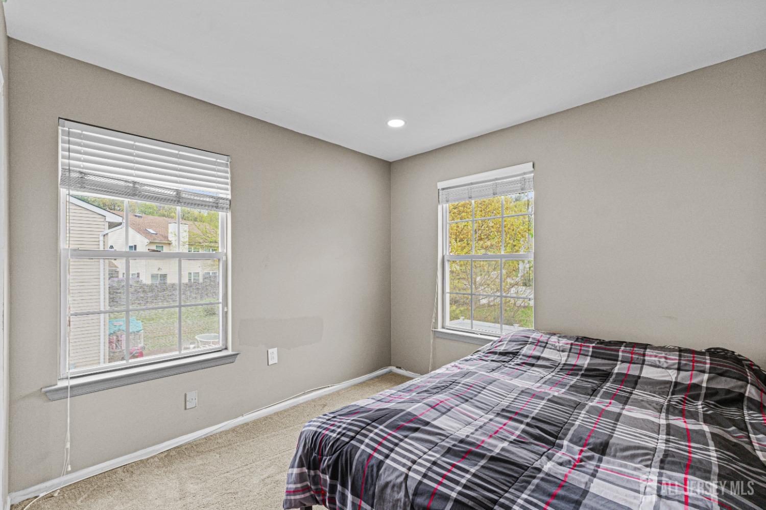 26 Brewster Circle Old Bridge, NJ 08857 - Photo 28 of 43 a bedroom with a bed and a window