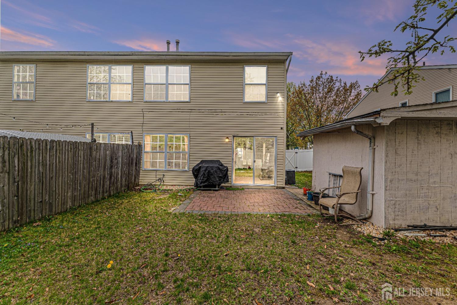 26 Brewster Circle Old Bridge, NJ 08857 - Photo 34 of 43 a view of a house with backyard and sitting area