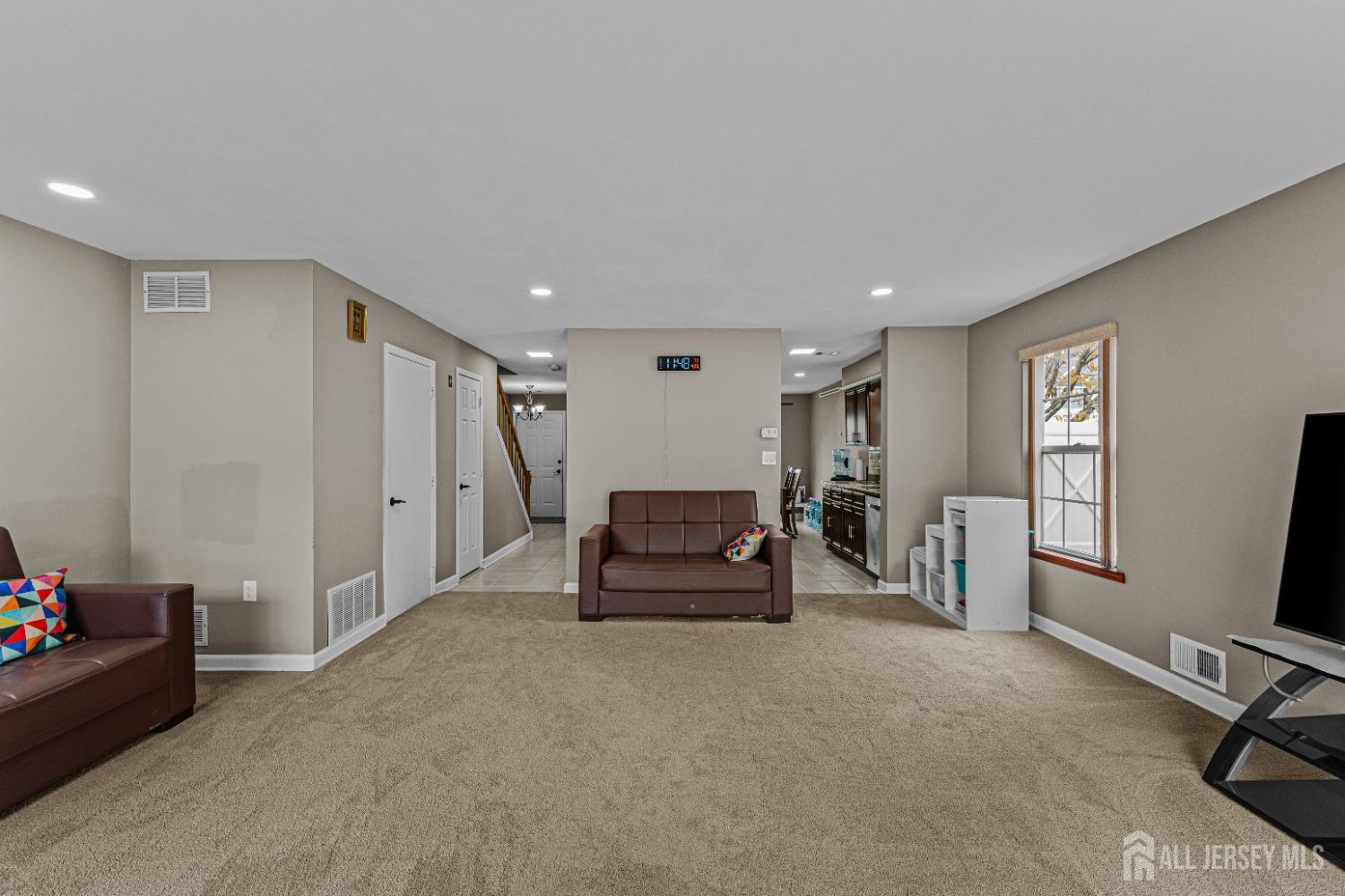 26 Brewster Circle Old Bridge, NJ 08857 - Photo 7 of 43 a view of a livingroom with furniture and windows