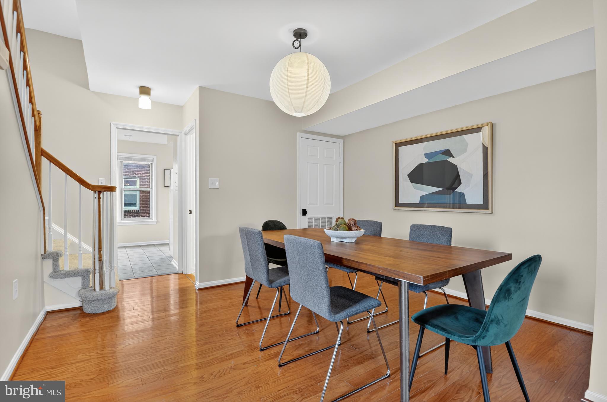 1493 A Street Northeast Washington, DC 20002 - Photo 11 of 31 a view of a dining room with furniture and wooden floor