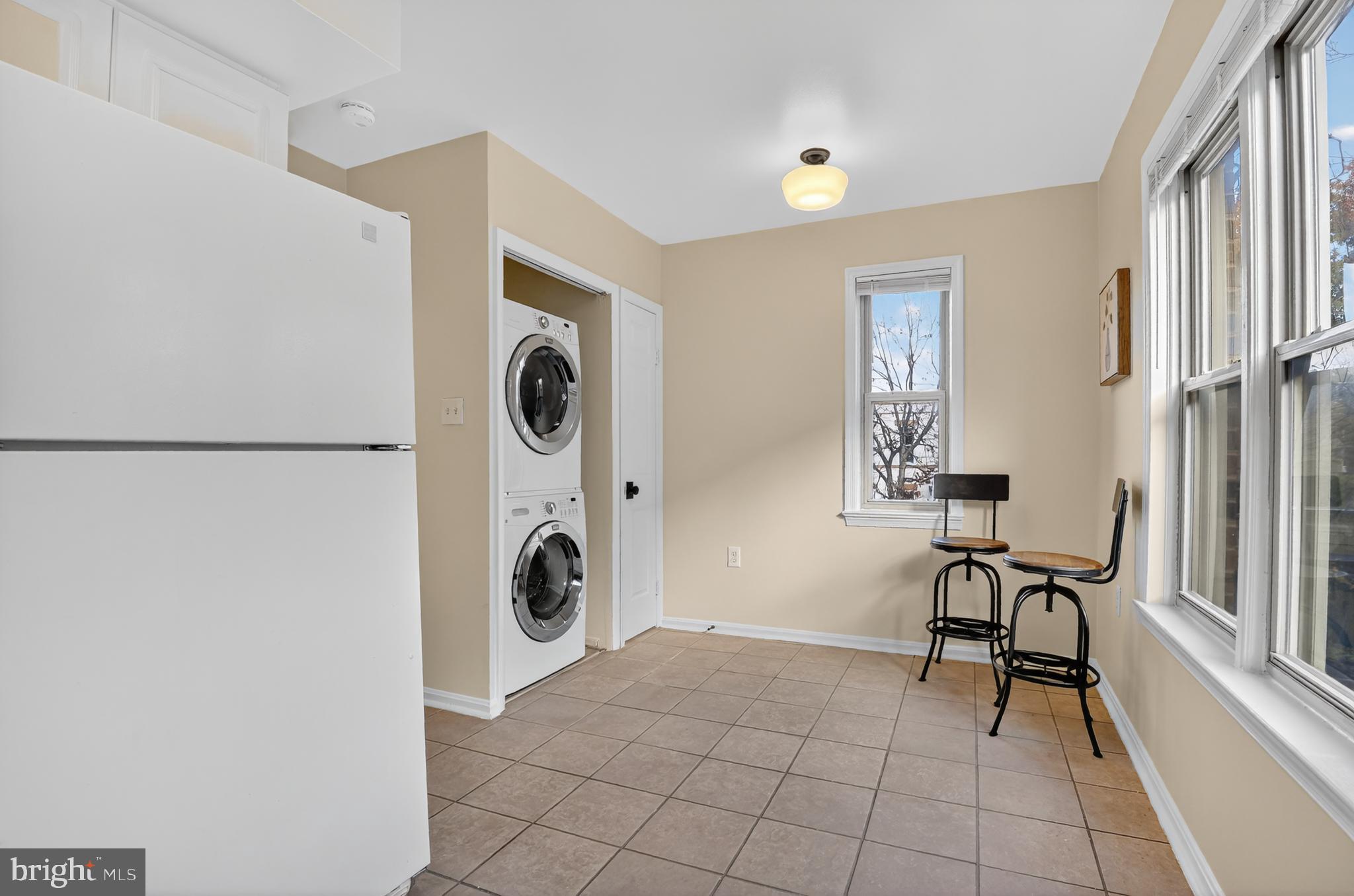 1493 A Street Northeast Washington, DC 20002 - Photo 17 of 31 a view of a livingroom with furniture and a window