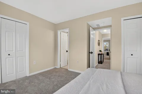 a view of a bedroom with a wardrobe space