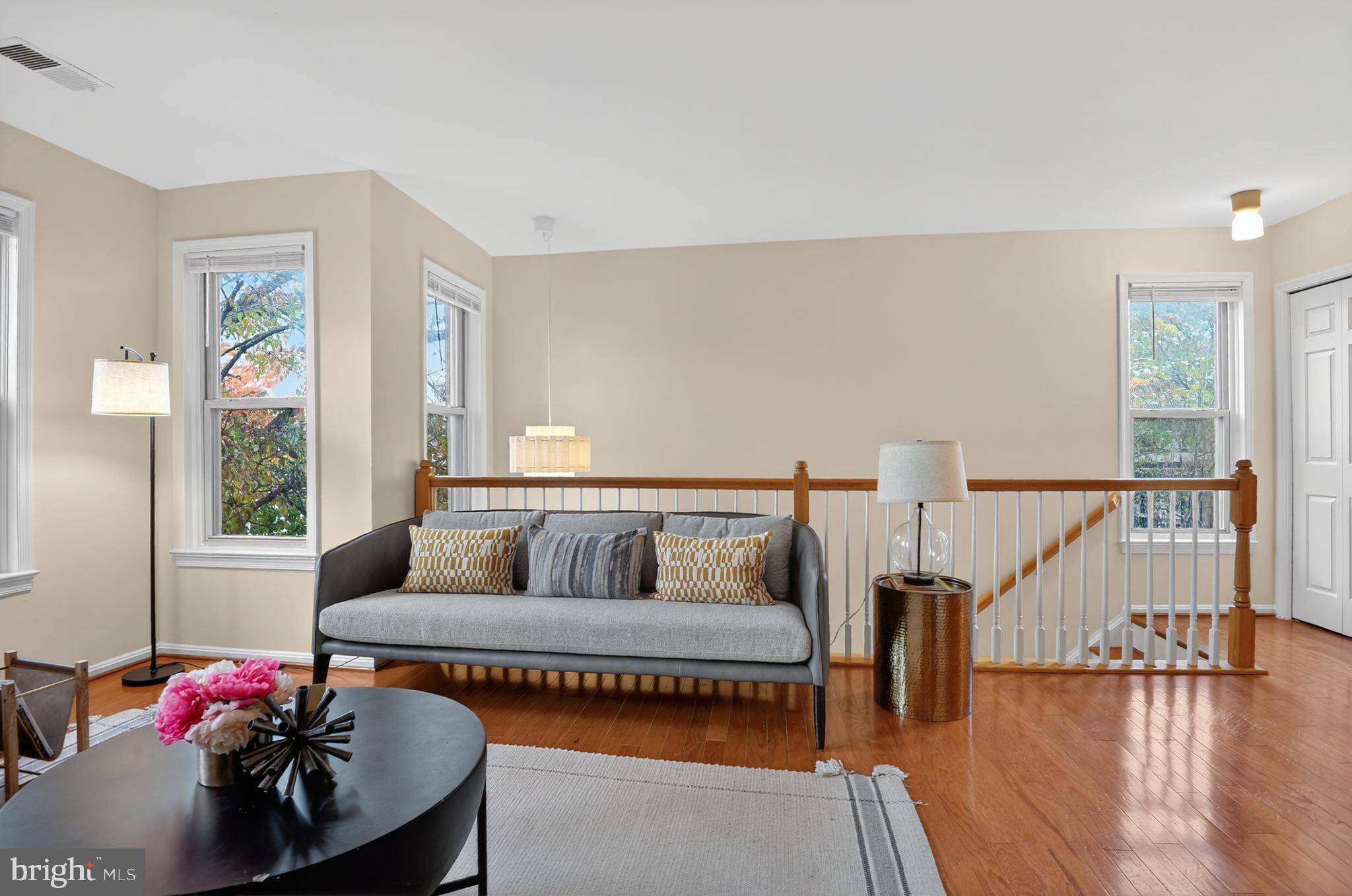 1493 A Street Northeast Washington, DC 20002 - Photo 5 of 31 a living room with furniture and a wooden floor