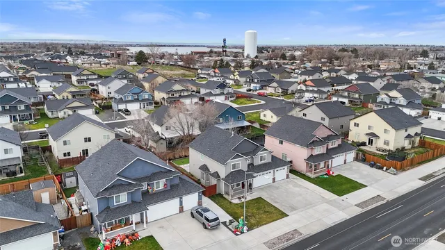 an aerial view of a city with lots of residential buildings