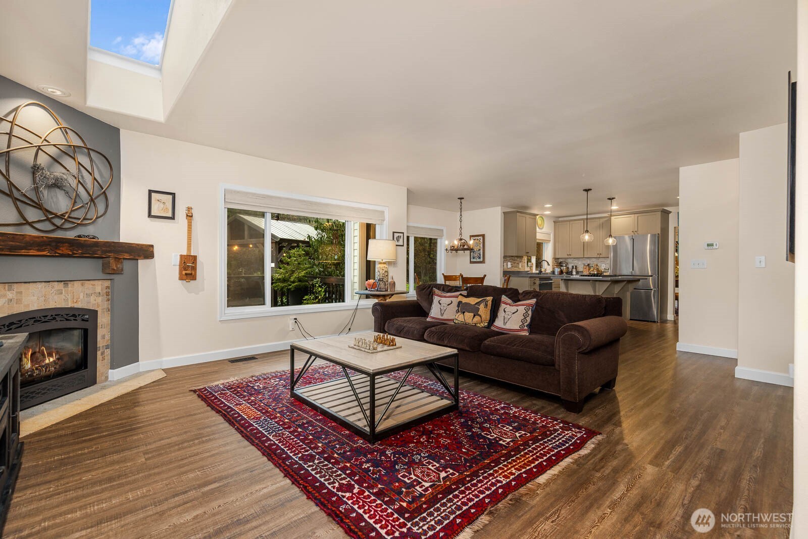 20928 Welch Road Snohomish, WA 98296 - Photo 12 of 29 a living room with furniture and a fireplace