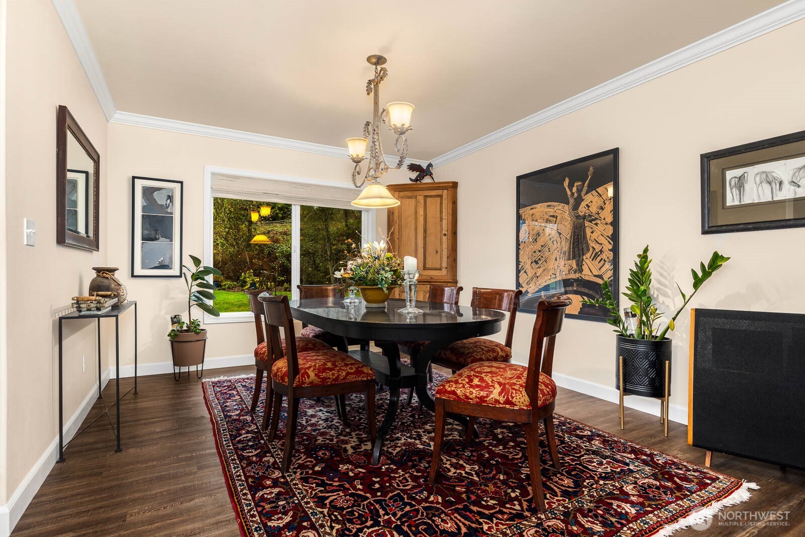 20928 Welch Road Snohomish, WA 98296 - Photo 15 of 29 a view of a dining room with furniture and wooden floor
