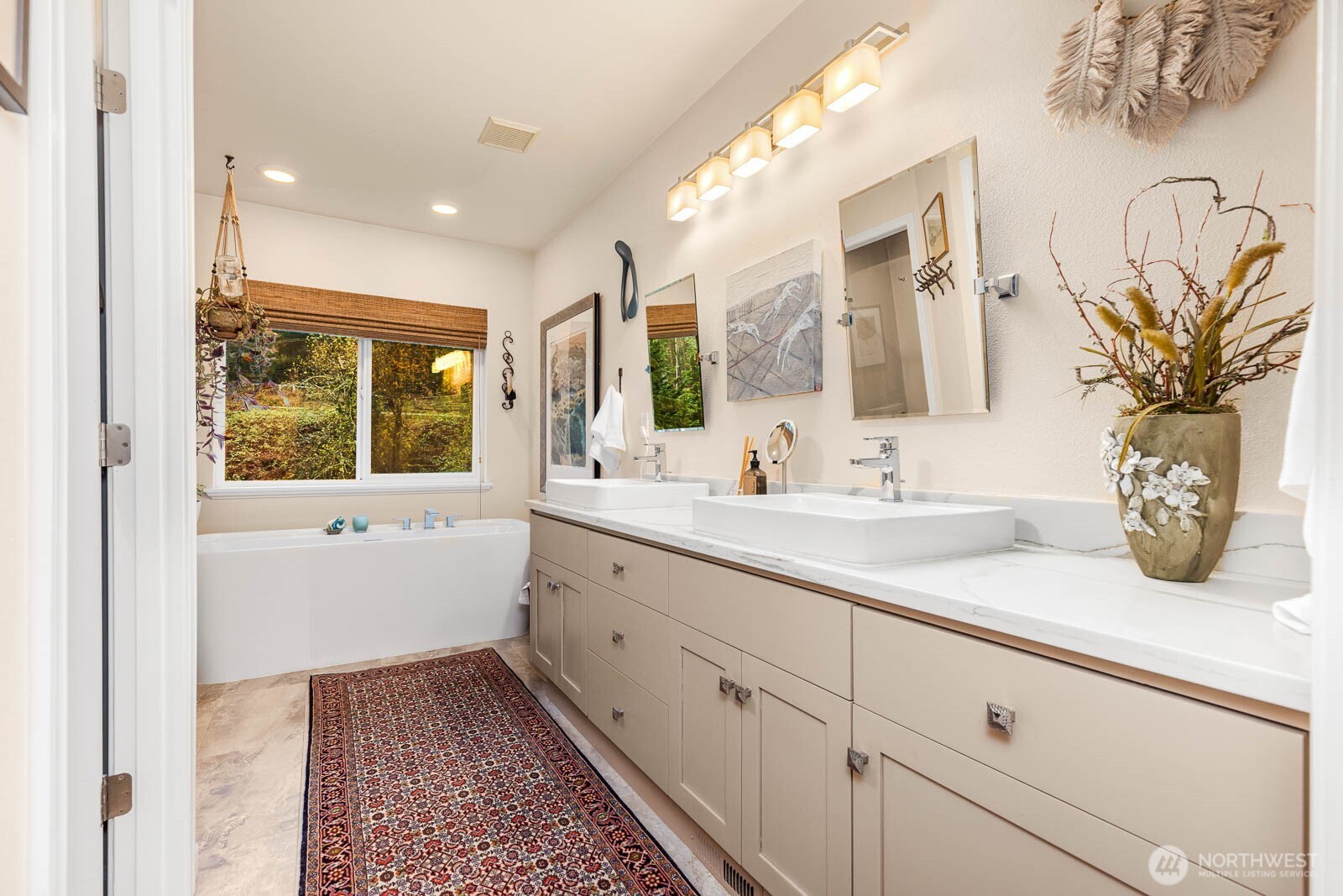 20928 Welch Road Snohomish, WA 98296 - Photo 18 of 29 a bathroom with a sink a mirror and a window
