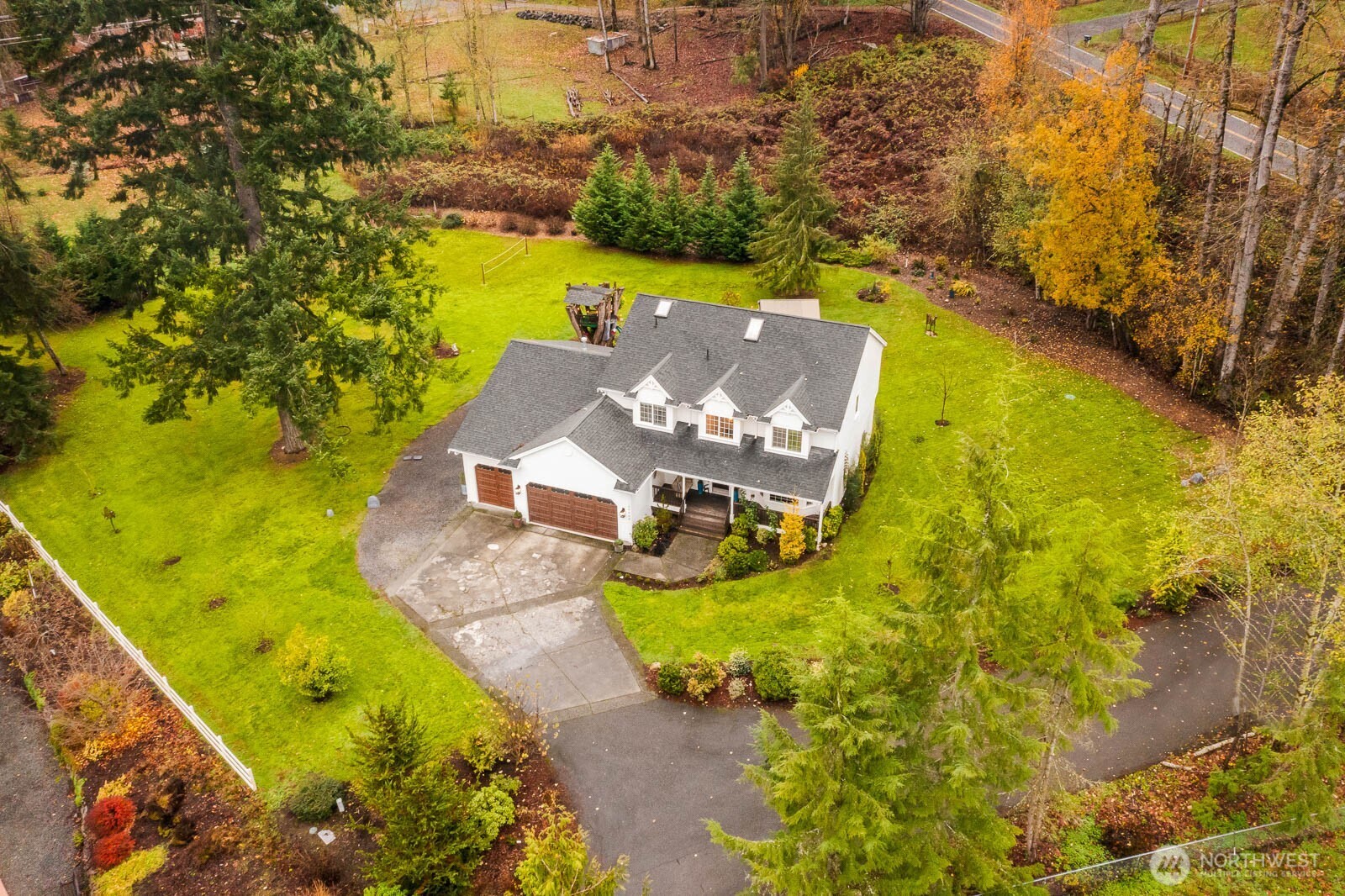 20928 Welch Road Snohomish, WA 98296 - Photo 2 of 29 an aerial view of a house with a ocean view