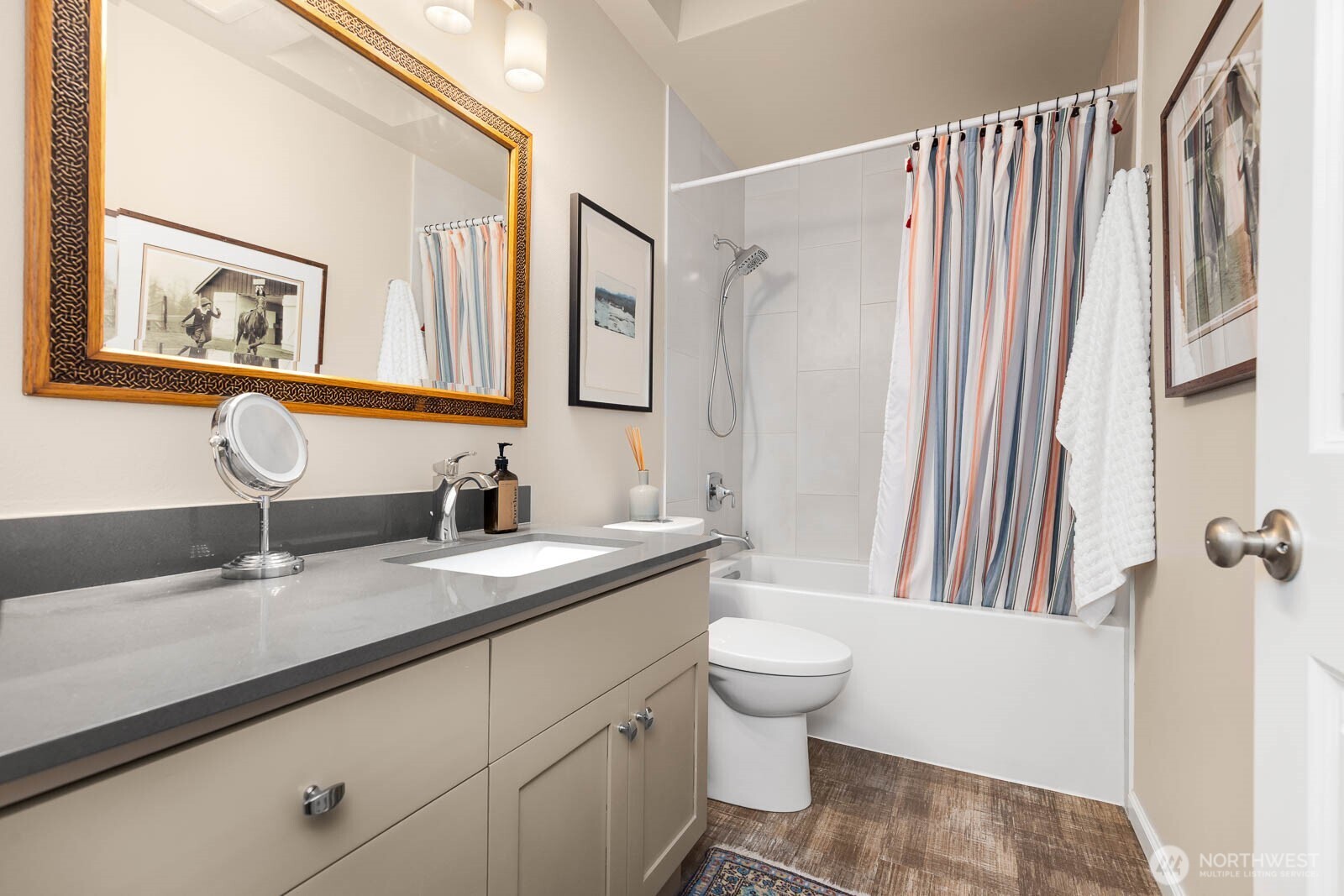 20928 Welch Road Snohomish, WA 98296 - Photo 21 of 29 a bathroom with a granite countertop sink and a mirror