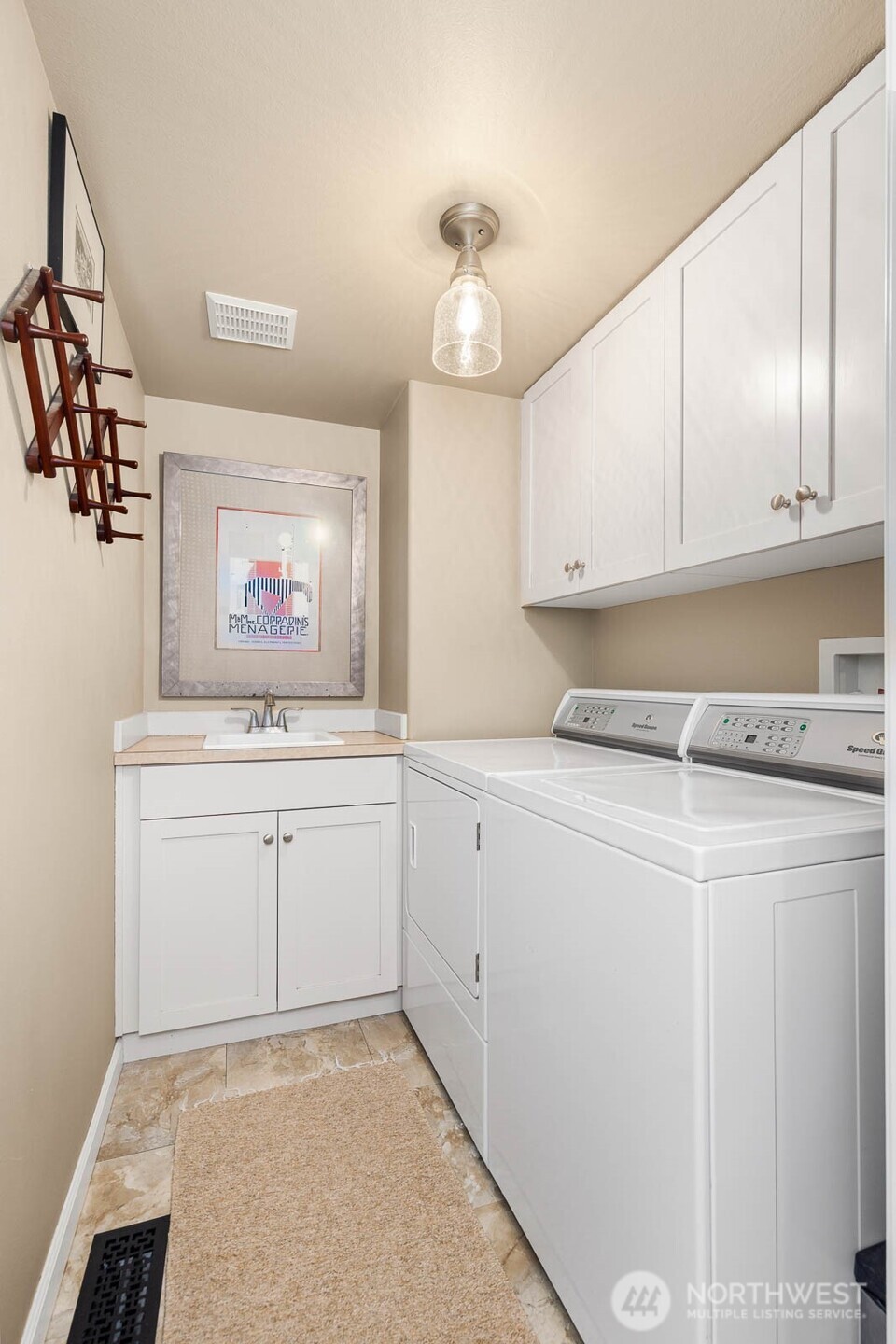 20928 Welch Road Snohomish, WA 98296 - Photo 24 of 29 a room with a cabinets and window