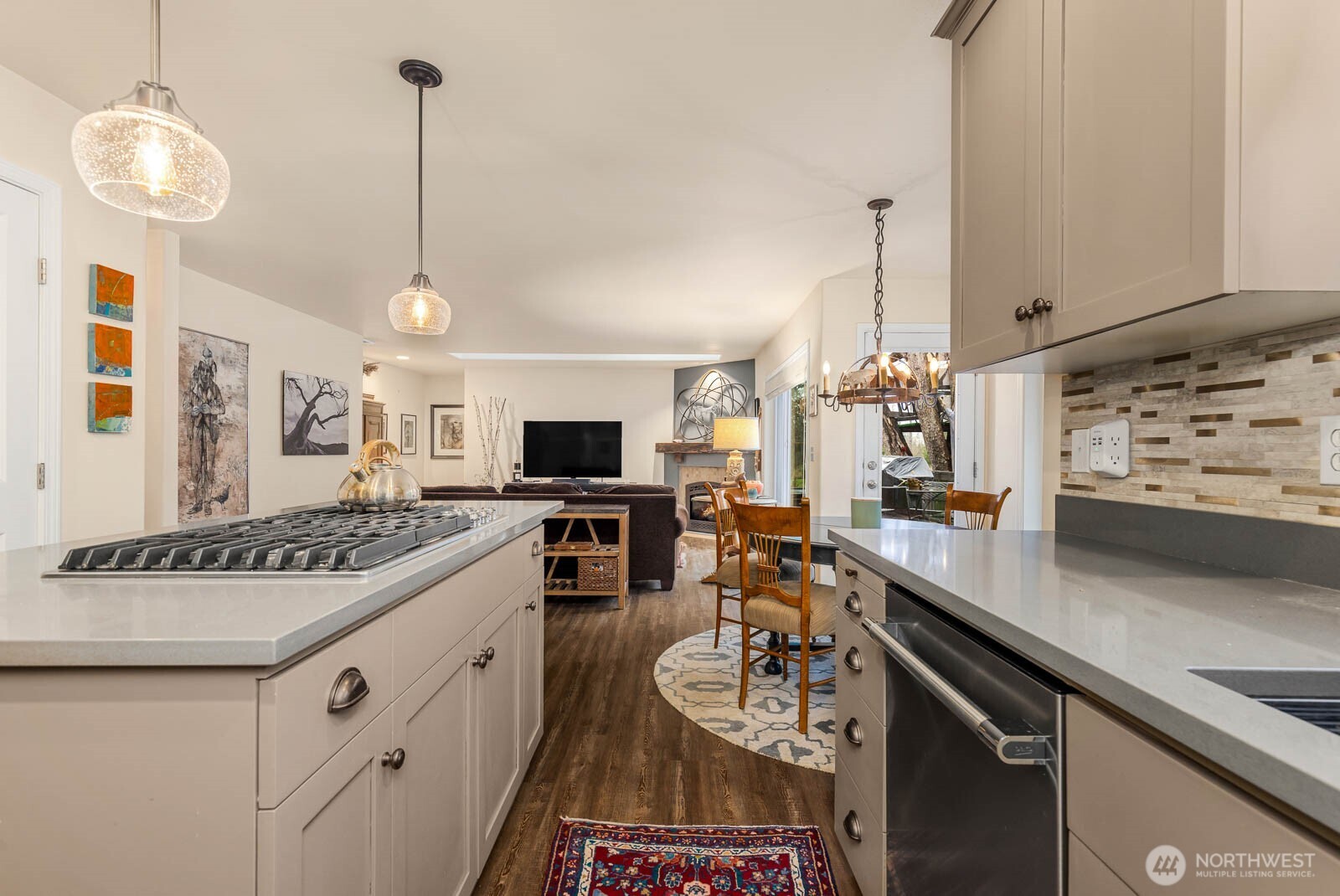 20928 Welch Road Snohomish, WA 98296 - Photo 8 of 29 a kitchen with a stove and a kitchen island