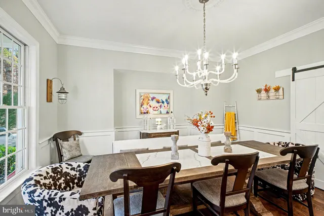 a living room with furniture fireplace and flat screen tv