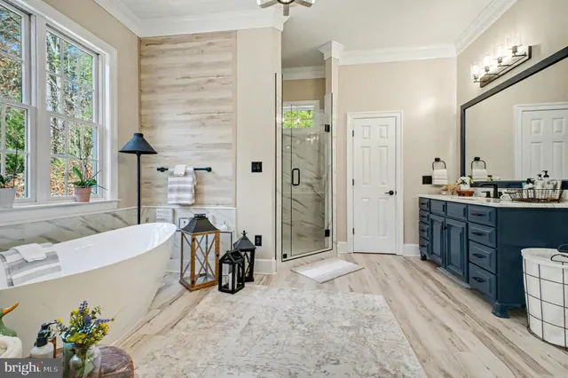 a bathroom with a sink toilet and a mirror