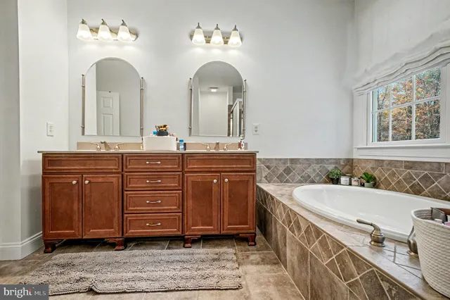 a view of a yard and front view of a house