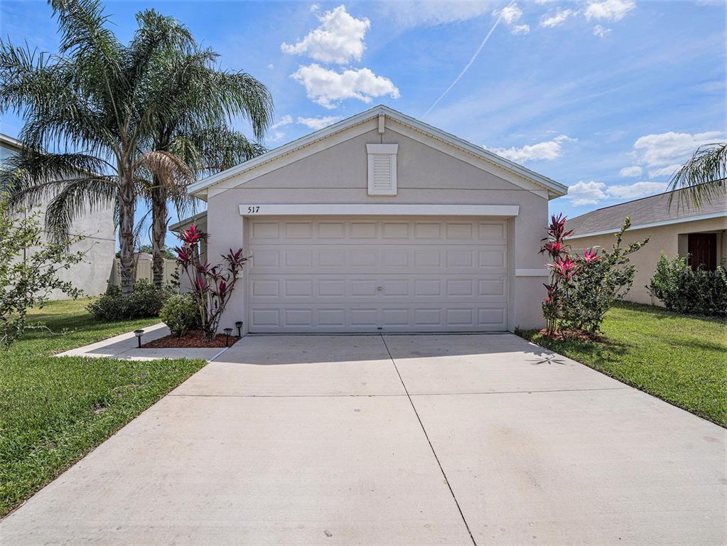 a front view of house with yard