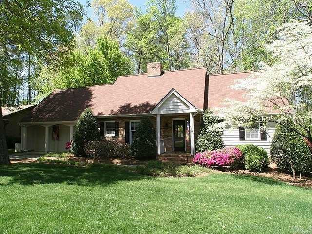 1909 Hunting Ridge Road Raleigh, NC 27615 - Photo 1 of 12 Charming home and lovely landscaping in great country club community. Exterior Front