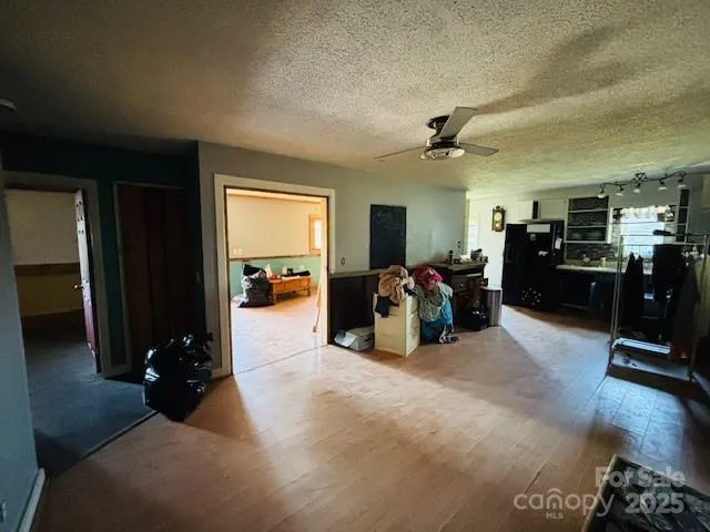 a room with furniture and a flat screen tv